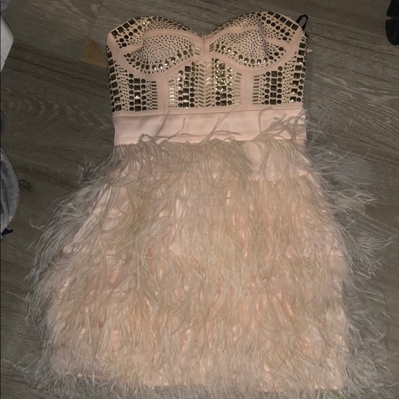 bebe Dresses & Skirts - Pink nude mini dress with studs and feathers bebe Dresses & Skirts - Pink nude mini dress with studs and feathers